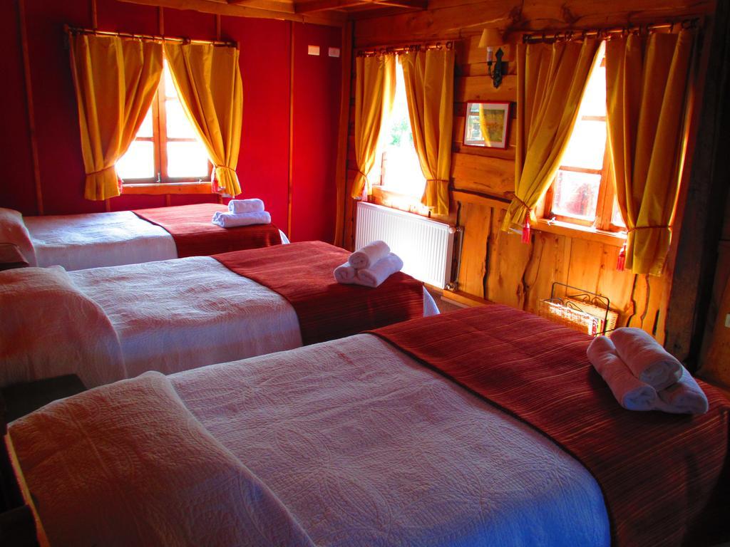 Hotel Antigua Casona Patagonia Futaleufú Quarto foto